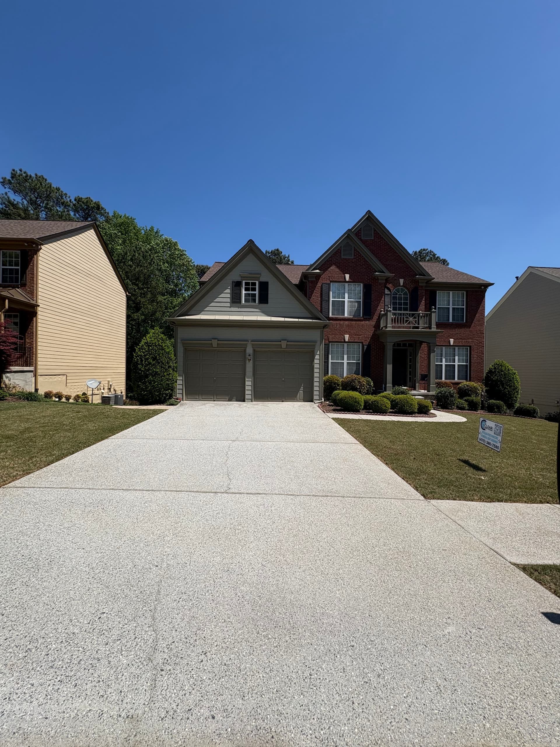 Driveway, Sidewalk, and Basement Patio Pressure Washing in Woodstock image